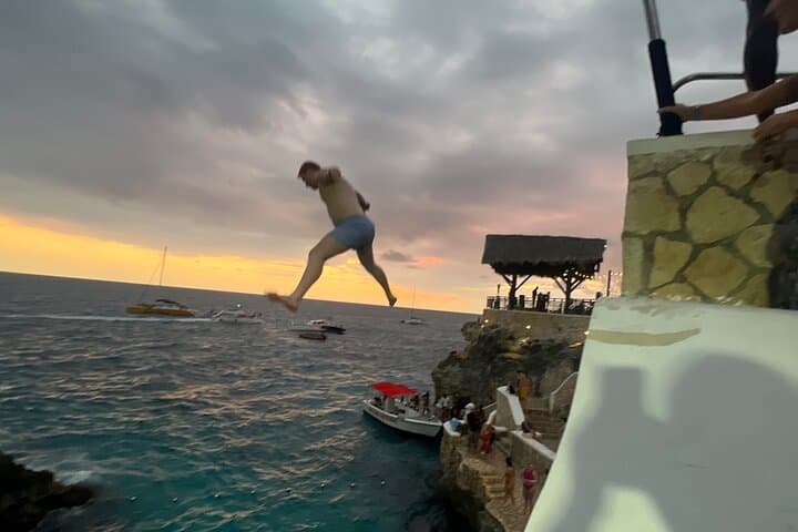 Negril Private Day Tour: ATV Ride, 7-Mile Party Catamaran & Rick's Cafe Sunset photo 5