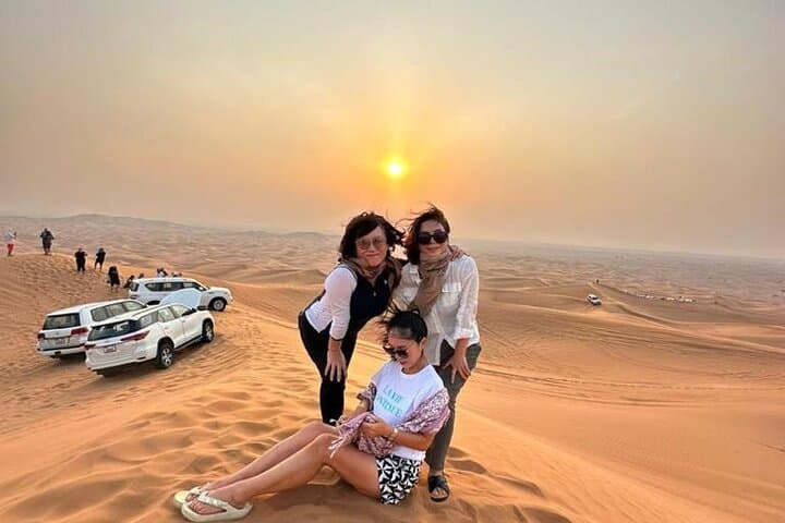 Dubai Evening Desert Safari: Private Sunset Dune Bashing, Dinner & Cultural Show