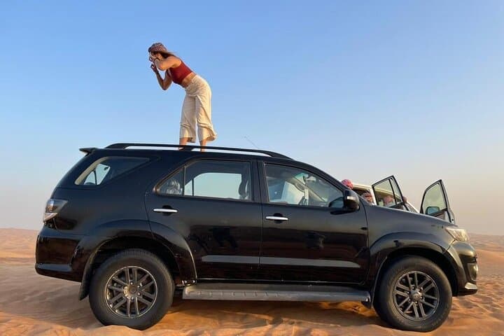 Dubai Evening Desert Safari: Private Sunset Dune Bashing, Dinner & Cultural Show photo 2