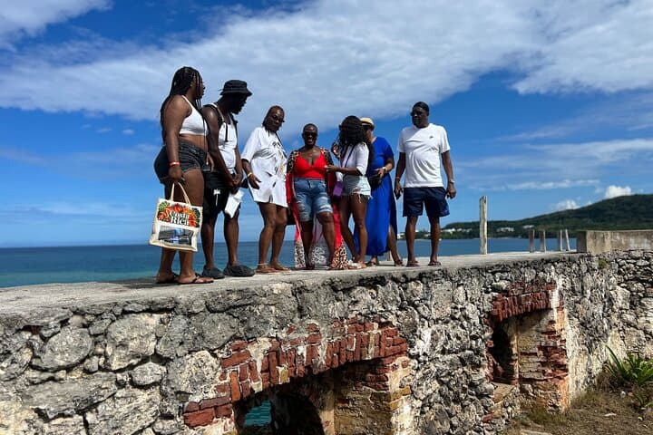 Negril Day Tour from Montego Bay: Rick's Cafe, Fort Charlotte & Beach Activities photo 4