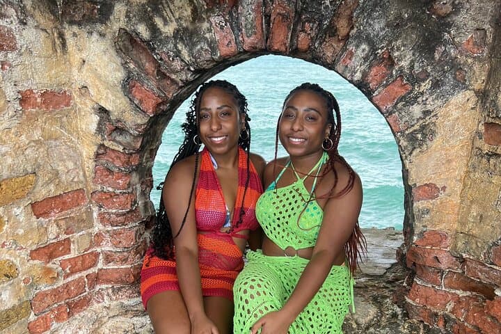 Negril Day Tour from Montego Bay: Rick's Cafe, Fort Charlotte & Beach Activities photo 6