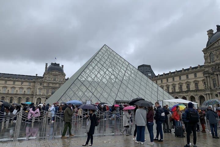 4-Hour Paris Walking Tour: Eiffel Tower, Louvre & Seine Cruise with Local Guide photo 5