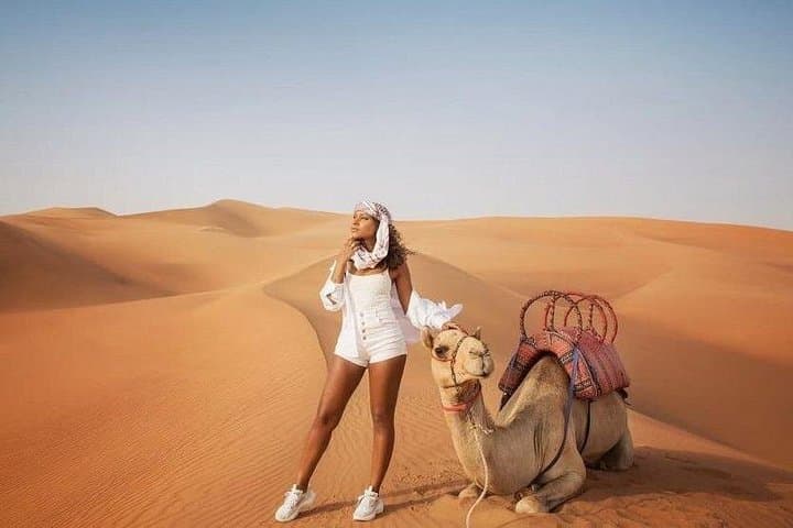 Morning Red Dune Safari with Camel Trekking and Sandboarding in Dubai photo 2