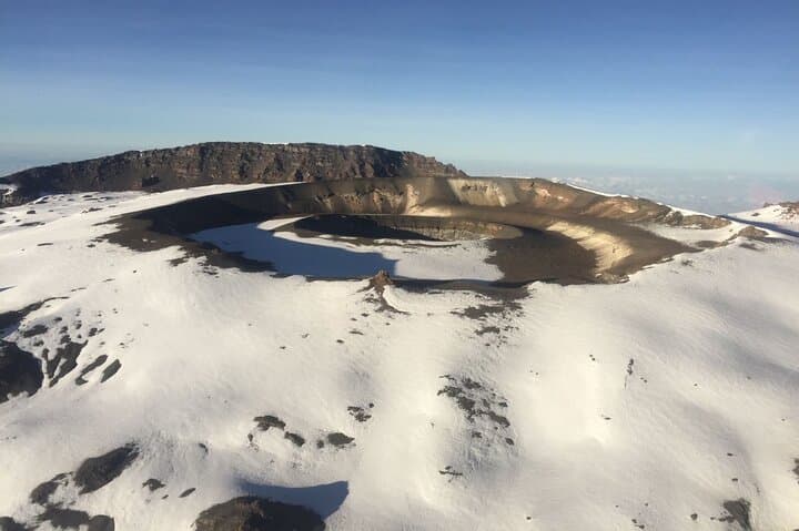 Kilimanjaro Helicopter Tour: Kibo Landing & Aerial Views from Arusha photo 3