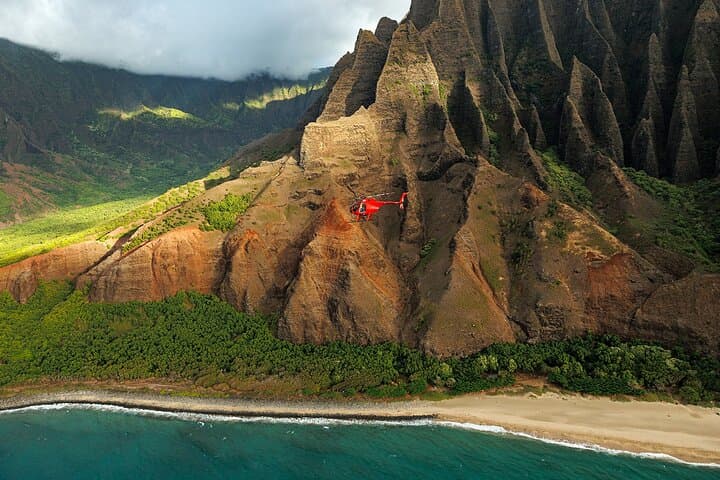 Experience Kauai’s Untamed Beauty with a Doors-Off Hughes 500 Helicopter Flight photo 2