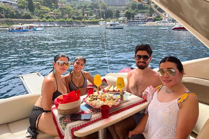 Private Letojanni Boat Tour: Taormina, Isola Bella & Etna Views photo 3