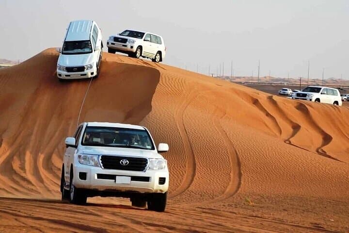 Private Dubai Desert Safari with Dune Bashing & BBQ Under the Stars