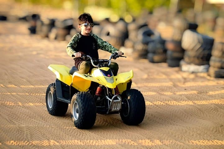 Dubai Red Dunes Quad Bike Adventure: 1-Hour ATV Ride with Pickup & Sunset Views photo 3