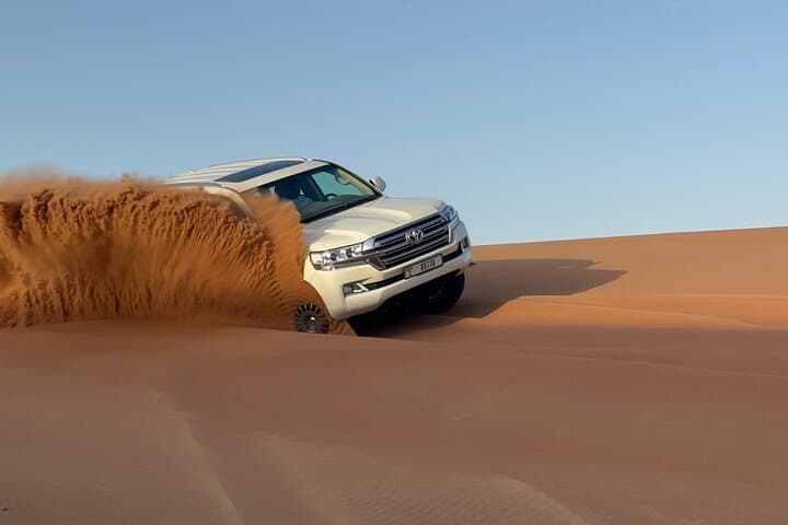 Evening Desert Safari in Dubai: Red Dunes, Dune Bashing & BBQ Under the Stars photo 4