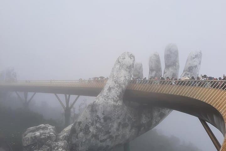 Ba Na Hills & Golden Bridge Day Tour: Cable Car, French Village & Fantasy Park photo 5