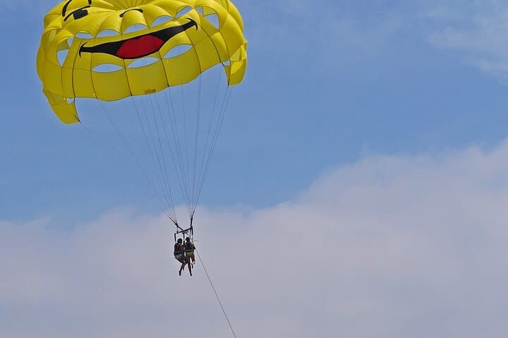 Parasailing Over Santorini’s Black Beach: 10-Min Flight Above Perivolos photo 3