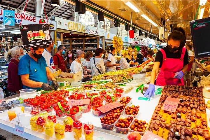 Taste of Valencia: Mercado Central Tapas Walk & Historic Paella Experience
