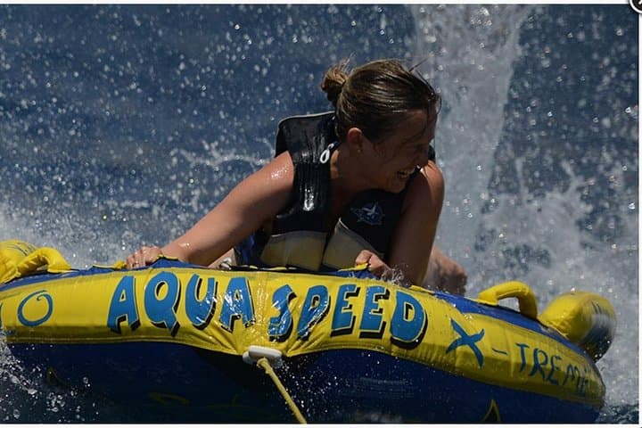 Thrill Waves Tubing at Perivolos Beach Santorini — Aegean Tube Ride photo 4