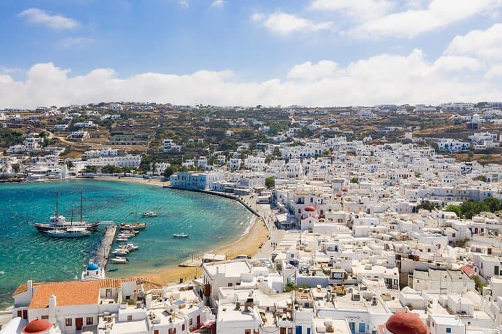 Private Full-Day Mykonos Tour from Athens — Windmills, Beaches & Petros photo 2