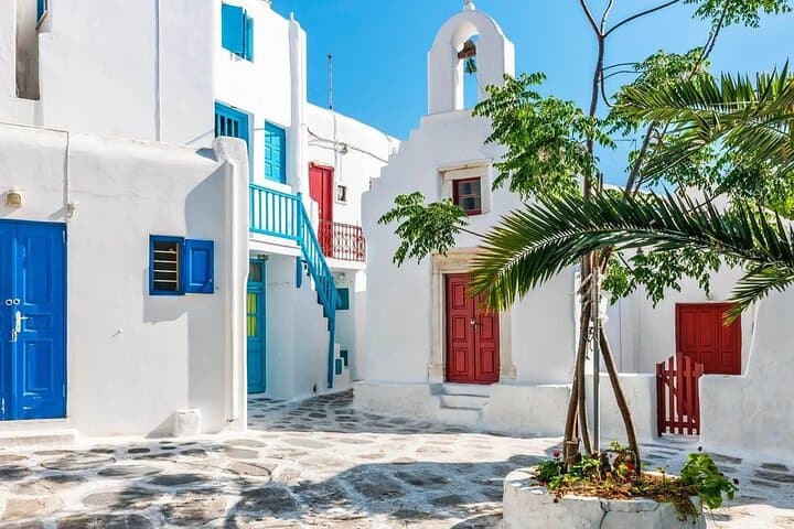 Private Full-Day Mykonos Tour from Athens — Windmills, Beaches & Petros photo 4