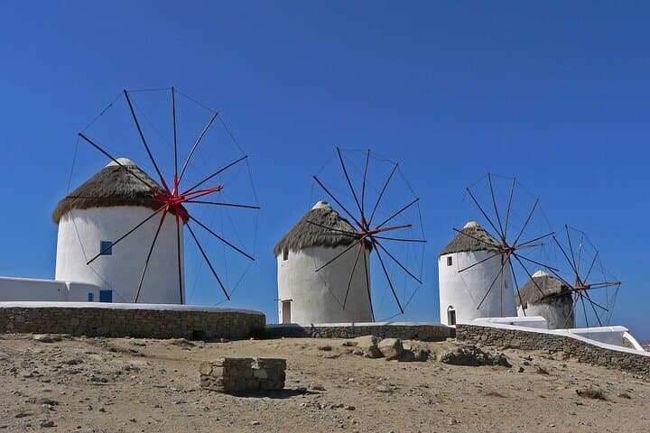 Private Full-Day Mykonos Tour from Athens — Windmills, Beaches & Petros photo 5