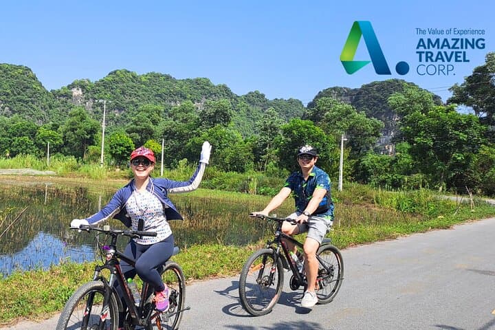Private Luxury Day Tour to Thien Ha Cave & Trang An — Sampan Boat, Cycling & Local Family Visit photo 4