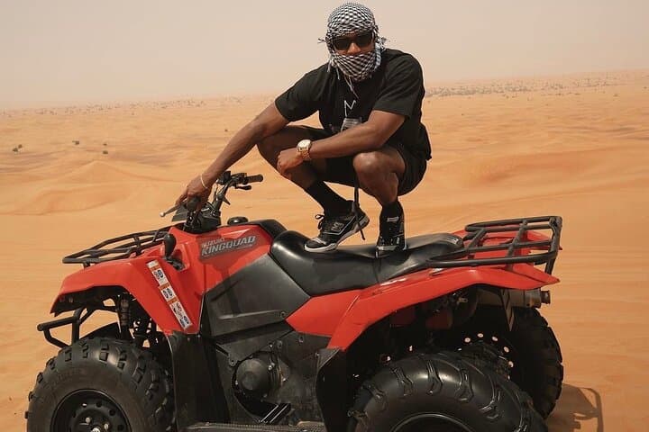 Dubai Red Dunes Quad Safari: Sandboarding, Camel Ride & Photo Stops photo 3
