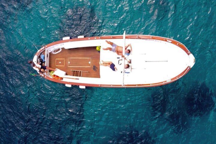 Capri Boat Tour with Captain Danilo — Blue Grotto, Faraglioni & Swim Stops photo 5