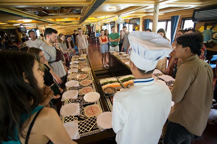 Overnight Ha Long Bay Cruise with Balcony: Kayaks, Caves & Ti Top Views photo 3
