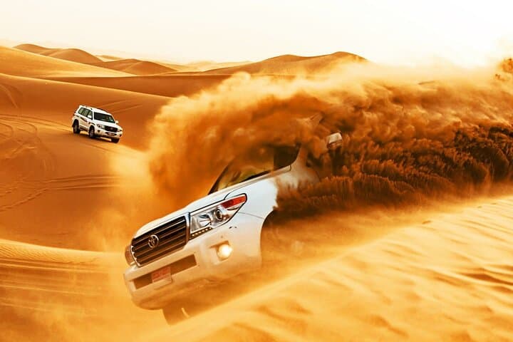 Evening Dubai Desert Safari with Dune Bashing, Camel Rides & BBQ Dinner photo 2