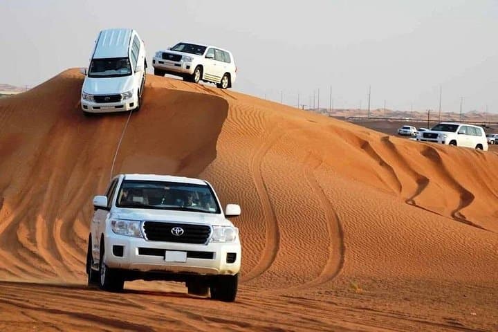 Private Morning Dubai Desert Safari: Luxury Dune Drive, Camel Ride & Sandboarding photo 1