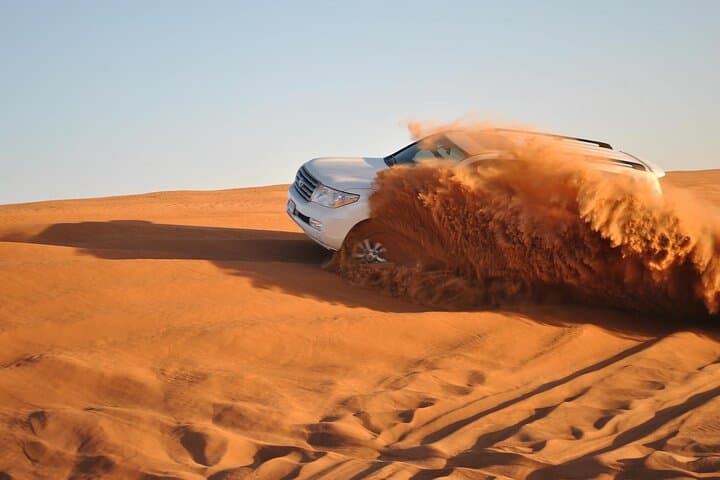 Red-Dune Desert Safari: Sandboarding, Camel Ride & Platinum Camp Experience