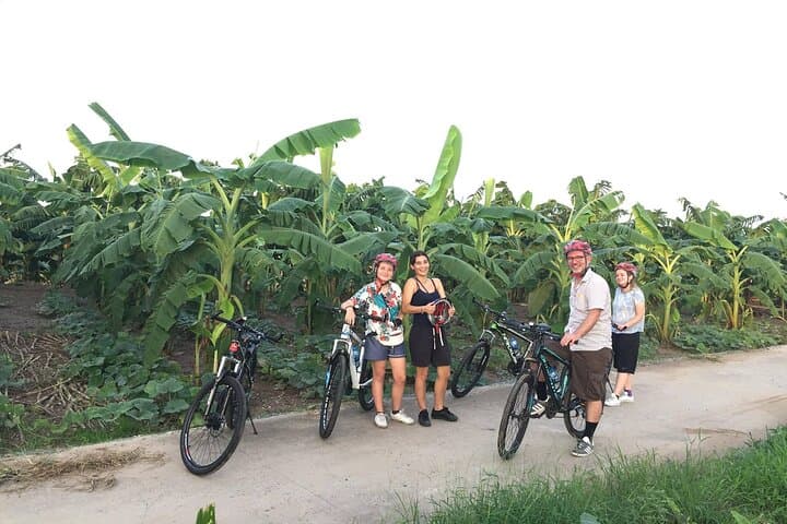 Hanoi Biking: Long Bien Bridge to Red River Island Half-Day Tour photo 5