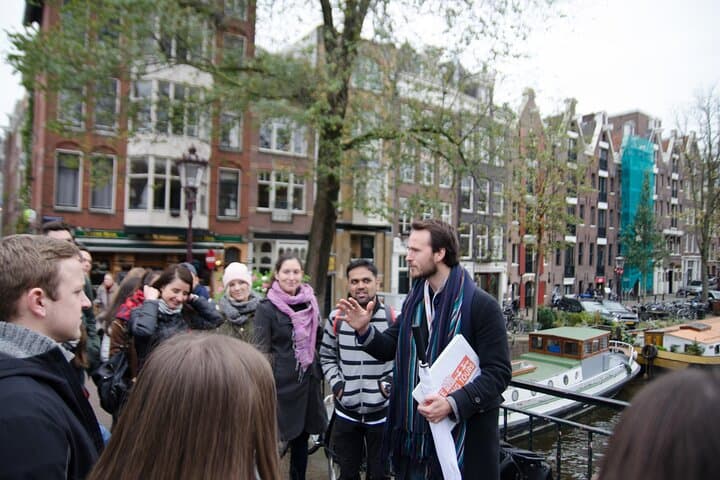 Walk Amsterdam with a Local Storyteller — 2-Hour Dam Square to Canal Tour photo 4
