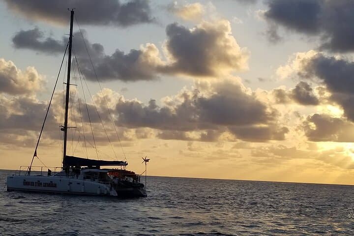 Sunset Catamaran, Snorkel & Bamboo Rafting with Limestone Massage in Jamaica