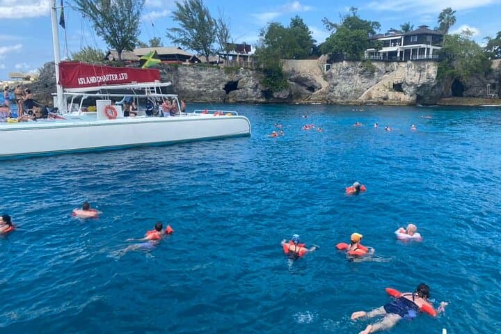 Negril Sunset Catamaran Cruise with Snorkeling and Reggae photo 2