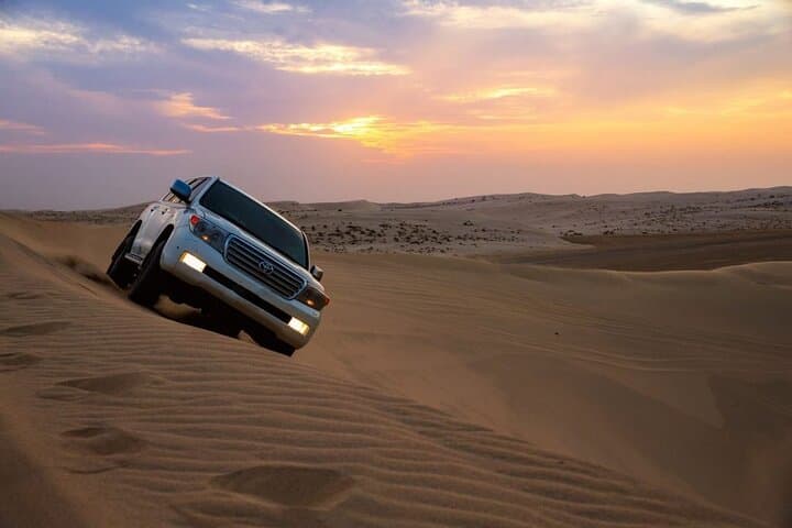 Morning Red Dune 4x4 Safari in Dubai: Dune Bashing, Quad Bikes & Camel Ride photo 4