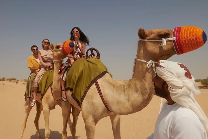 Red Dune Desert Safari Dubai: Camel Ride, Sandboarding & BBQ Dinner