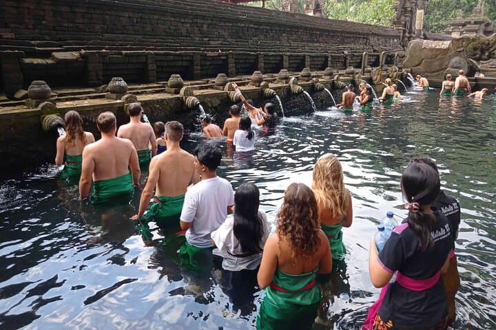 Cycling to Tirta Empul: Holy Water Blessing Bike Tour from Ubud photo 3