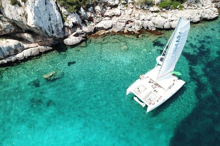 Catamaran Cruise Porto Conte Natural Park: Alghero Sailing, Snorkel & Seafood photo 5