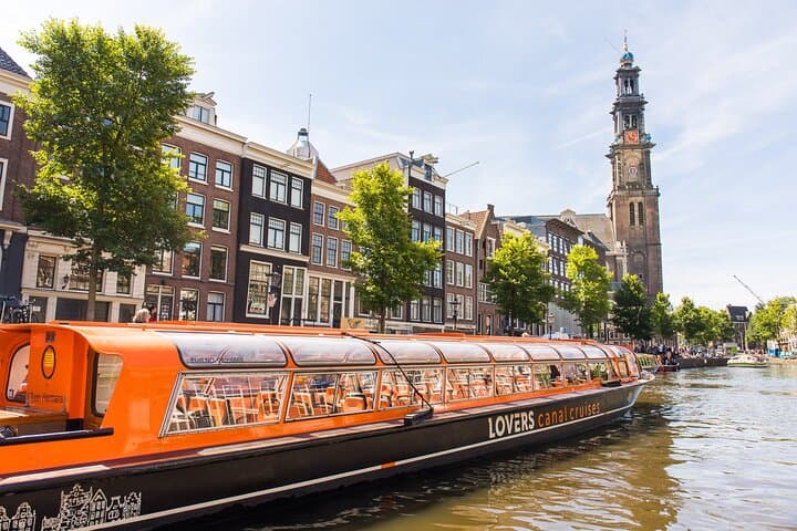 Hour-Long Amsterdam Canal Cruise: Glass-Top Sightseeing with Multilingual Audio Guide