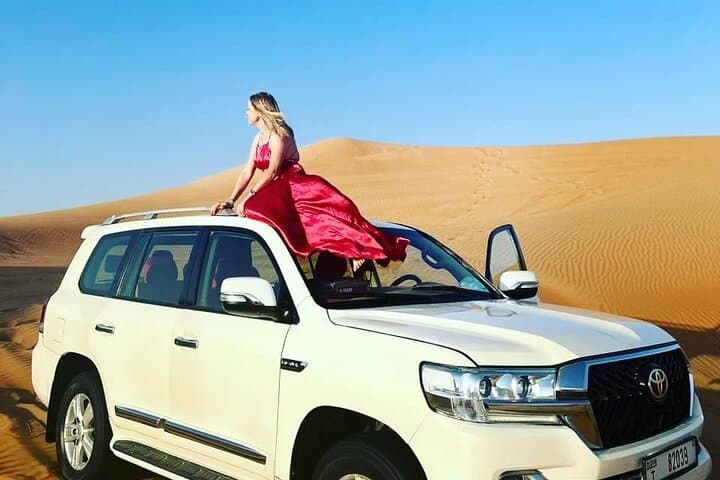 Sunrise Dubai Desert Safari: Private Camel Ride, Dune Bashing & Sandboarding