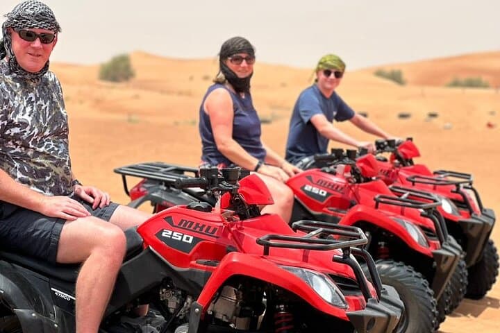Sunset Desert Safari & Quad Bike Adventure with VIP Dinner in Dubai photo 2
