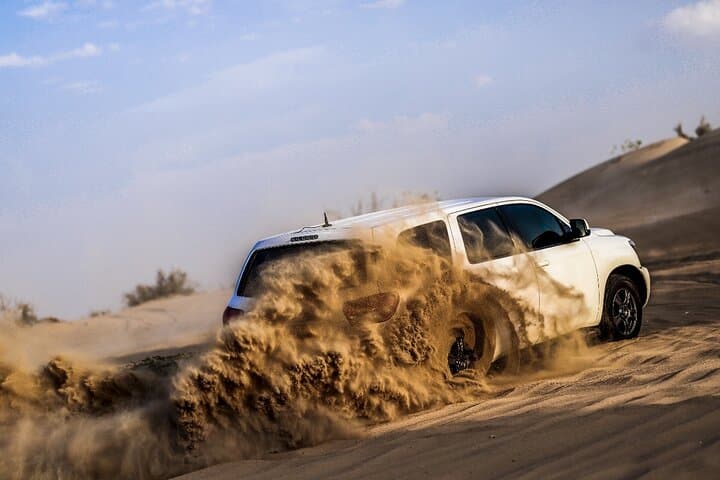 Dubai Evening Desert Safari: Dune Bashing, Bedouin Camp & BBQ Under the Stars