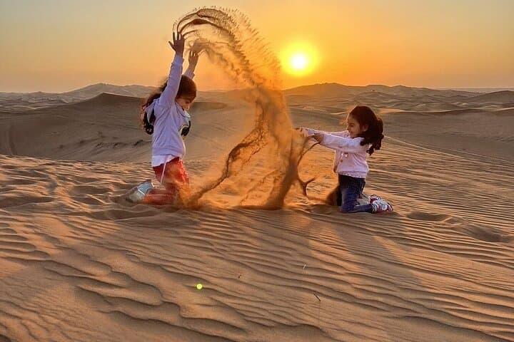 Dubai Red Dune Morning Safari: Quad Biking, Sandboarding & Camel Ride