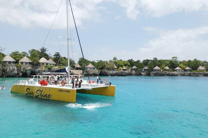 Negril Private Catamaran Charter: Snorkel Reefs, Caves & Rick's Cafe Cruise