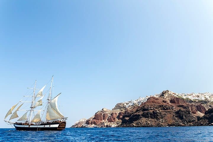 Sunset Sailing in Santorini: Volcano Rim, Hot Springs & Thirassia Swim