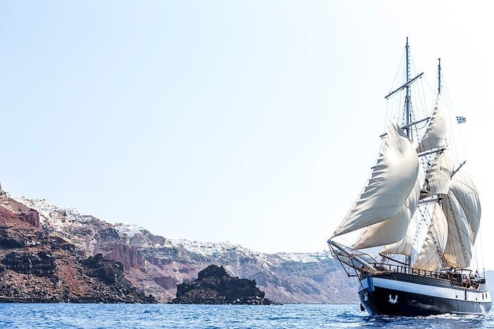 Sunset Sailing in Santorini: Volcano Rim, Hot Springs & Thirassia Swim photo 2