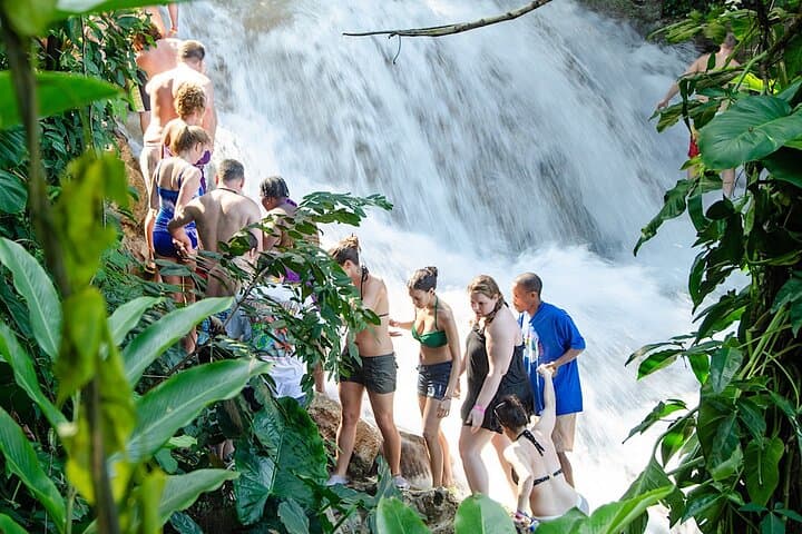 Private Dunn River Falls Tour from Negril: Climb Ocho Rios' Iconic Waterfall