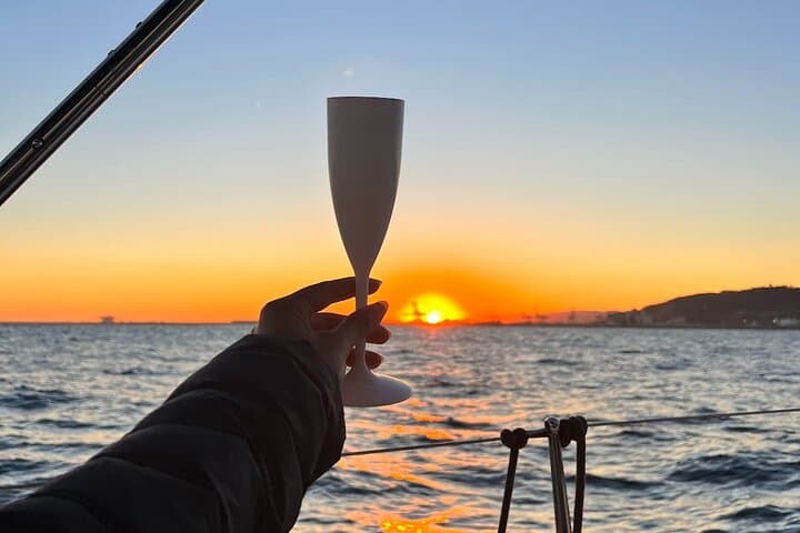 Barcelona Sunset Sail: Small-Boat Cruise with Open Bar at Port Olímpic