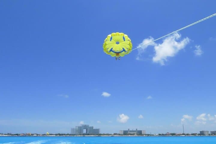 Soar and Submerge: Parasailing Plus Snorkeling Adventure in Cancun photo 4