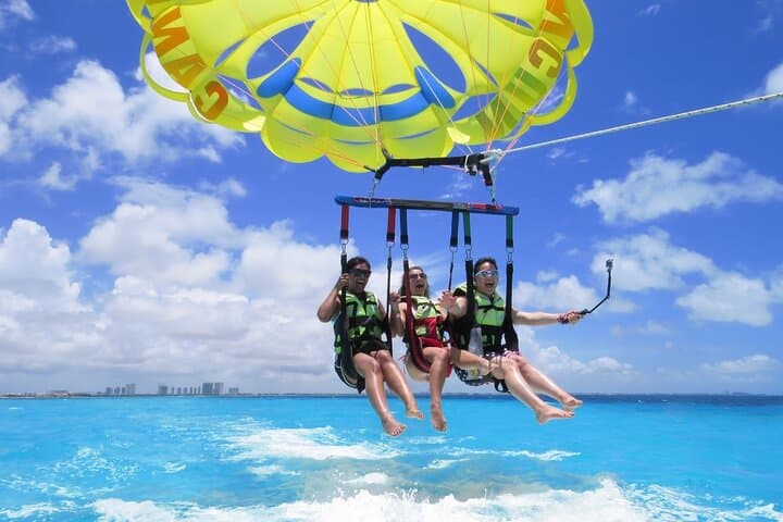 Soar and Submerge: Parasailing Plus Snorkeling Adventure in Cancun