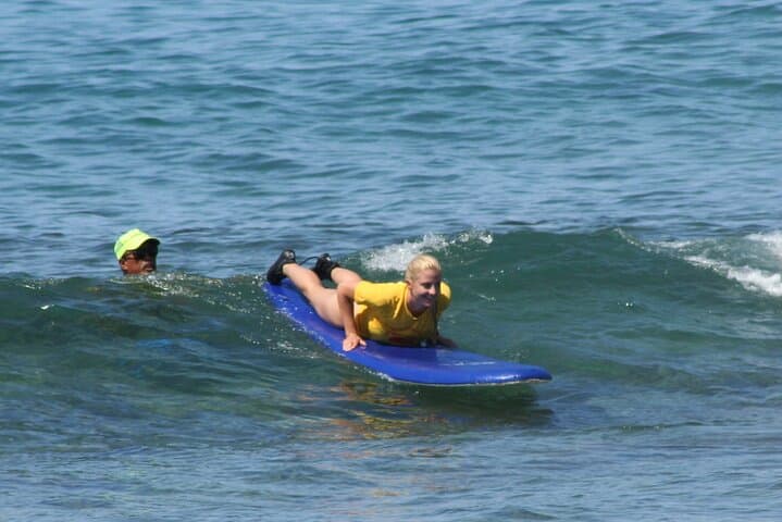 Sunny Po'ipu Semi-Private Surf Lesson: Learn to Ride Kauai Waves