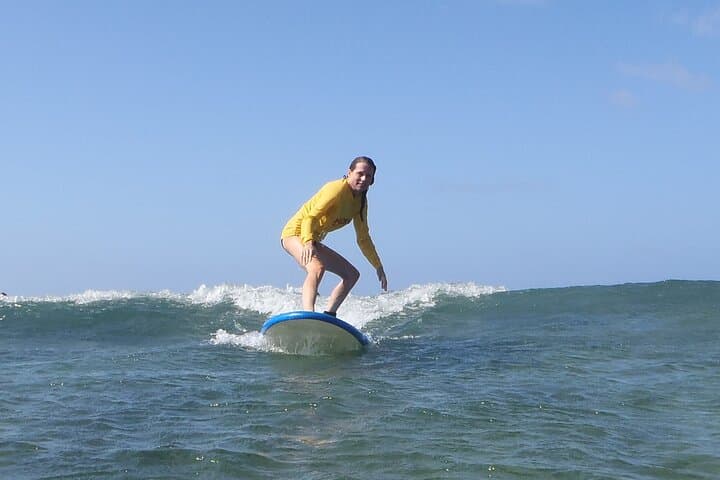 Sunny Po'ipu Semi-Private Surf Lesson: Learn to Ride Kauai Waves photo 2