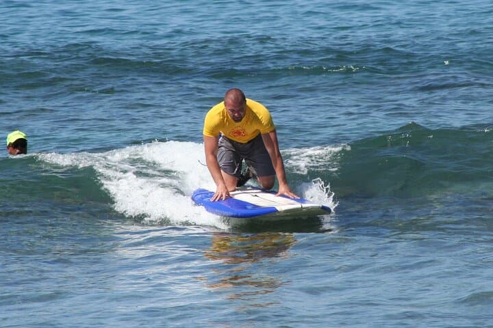 Sunny Po'ipu Semi-Private Surf Lesson: Learn to Ride Kauai Waves photo 3